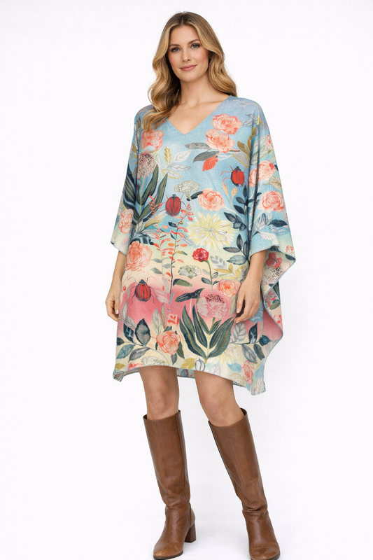 A lightweight Merino wool kaftan featuring a soft floral digital print and an easy, elegant drape.